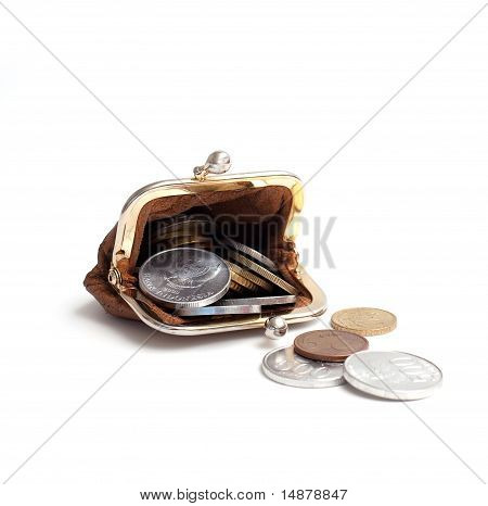 leather wallet with falling coins