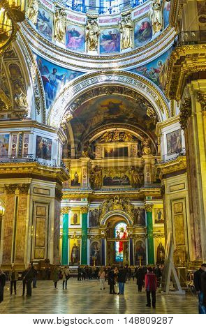 SAINT PETERSBURG RUSSIA - APRIL 25 2015: The rich interior of St Isaac's Cathedral one of the most impressive landmarks of the Russian Imperial capital on April 25 in Saint Petersburg.