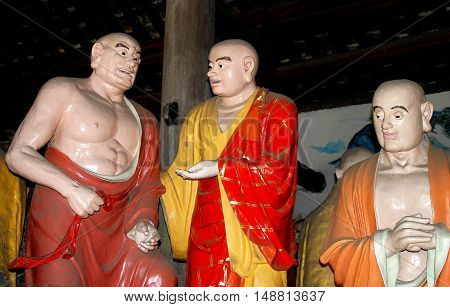 Shi Fang China - June 23 2007: Buddha figures in the South Arbat Hall of the historic Luo Han Temple dating to 650 A. D.