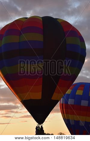 QUEENSBURY, NY - SEP 24: Balloon launch at dawn at the 2016 Adirondack Hot Air Balloon Festival held from Sep 22-25. Thousands of people attended the festival which is the largest of its kind on the East coast.