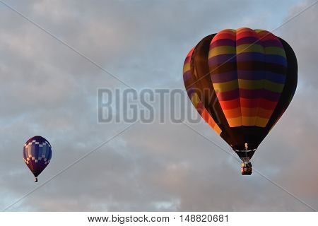 QUEENSBURY, NY - SEP 24: Balloon launch at dawn at the 2016 Adirondack Hot Air Balloon Festival held from Sep 22-25. Thousands of people attended the festival which is the largest of its kind on the East coast.