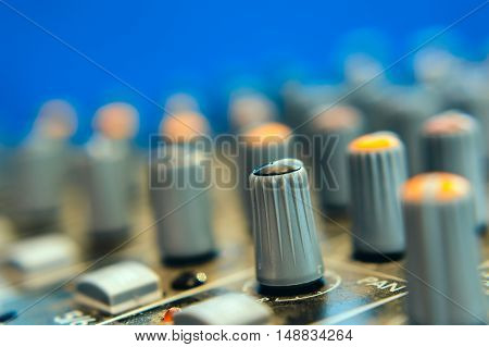 handle the equalizer on a mixing console