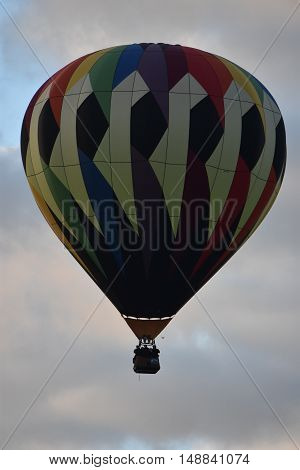 QUEENSBURY, NY - SEP 24: Balloon launch at dawn at the 2016 Adirondack Hot Air Balloon Festival held from Sep 22-25. Thousands of people attended the festival which is the largest of its kind on the East coast.