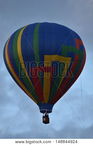 QUEENSBURY, NY - SEP 24: Balloon launch at dawn at the 2016 Adirondack Hot Air Balloon Festival held from Sep 22-25. Thousands of people attended the festival which is the largest of its kind on the East coast.