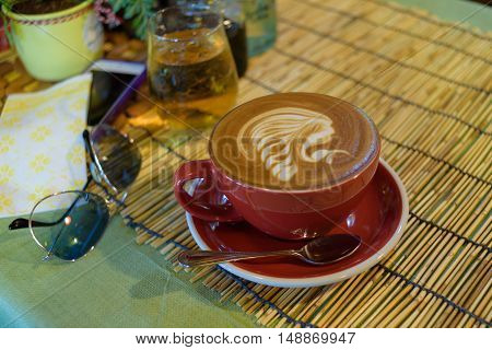 Coffee on background of wooden and life style objects.