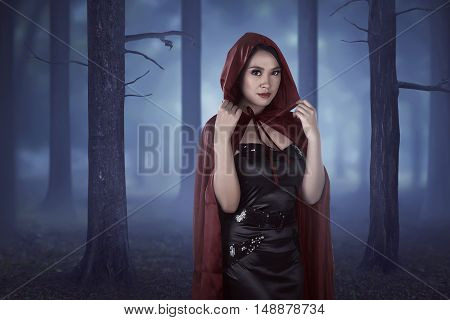 Beautiful Asian Girl Wearing A Red Hooded Cloak