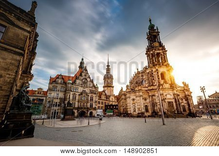 Dramatic view of cathedral Catholic Hofkirche and palace Georgenbau at old town. Historical scene, tourist attraction. Location place Dresden, Saxony, Germany, Europe. Beauty world.