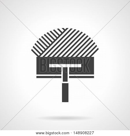 Symbol of trowel with cement or glue. Repairing works and home improvement. Warm floor insulation installing. Construction tools and instruments. Monochrome black flat design vector icon.