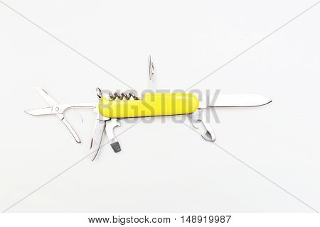 Multipurpose knife isolated on white with all neccessary tools all in one