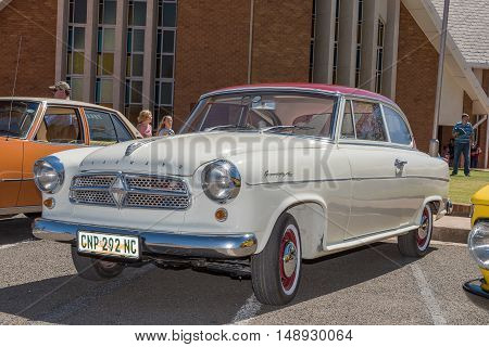 KIMBERLEY SOUTH AFRICA - SEPTEMBER 24 2016: A public display of new and vintage cars at a fair at the Dutch Reformed Church Vooruitsig in Kimberley