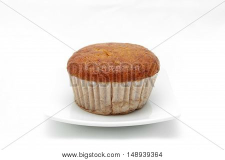 Banana cupcake with chololate on white plate
