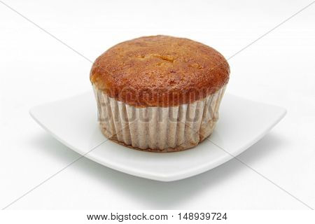 Banana cupcake with chololate on white plate