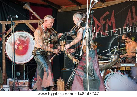 Cradem Aventure musicians stylized as the Goths performing on the Heidelberg folk festival and playing bagpipes rock - September 25 2016, Hedelberg, Germany