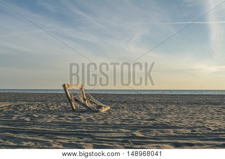 Football goal on the beautiful sandy beach