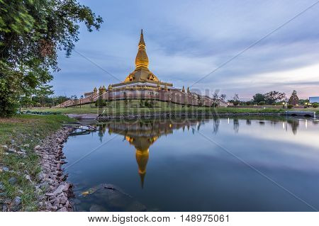 Maha Mongkol Bua Pagoda In Roi-ed Thailand At Sunset