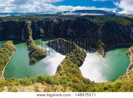 Meanders at rocky river Uvac gorge on sunny day, southwest Serbia.