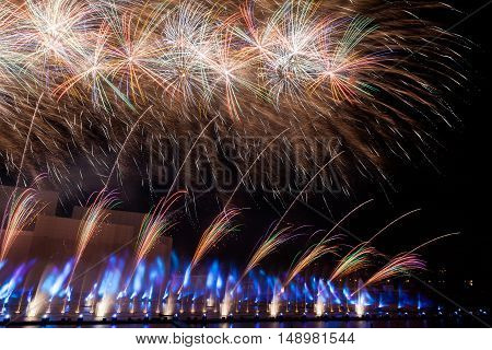 MOSCOW RUSSIA - SEPTEMBER 25 2016: The Circle of Light Moscow international festival 2016. Music fire light and fireworks show at the Krylatskoye Grebnoy Channel free open air performance.