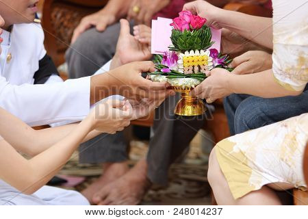 Groom And Bride Holding Khan Makk Or Tray Of Gifts In Traditional Thai Wedding Ceremony. Concept Of 