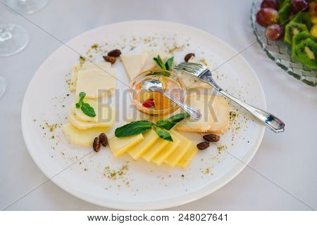 Hard Tasty Cheese On A Plate. Festive Snack