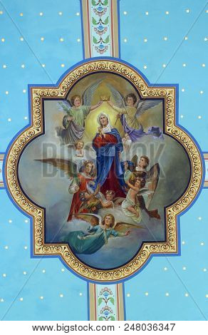 ZACRETJE, CROATIA - AUGUST 06: Coronation and Assumption of the Virgin Mary, fresco in the Parish Church of the Holy Cross in Zacretje, Croatia on August 06, 2017.