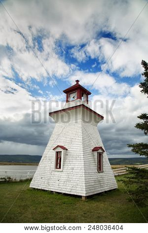 Anderson hollow lighthouse with a grey cloudy sky in New Brunswick in Canada