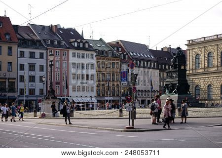 Munich, Germany - June 30: Tourists And Pedestrians On The Max-joseph-square Next To The Bronze Stat