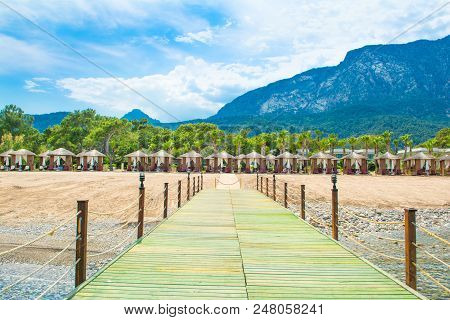 Wooden Beach Pavilions On The Shore Of A Sandy Beach - The Mediterranean Coast, Beldibi, Antalya, Tu