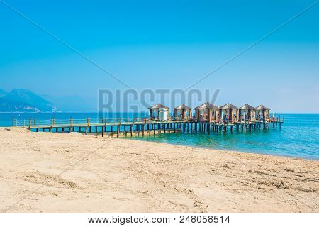 Wooden Beach Pavilions On The Shore Of A Sandy Beach - The Mediterranean Coast, Beldibi, Antalya, Tu