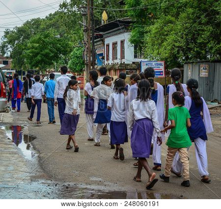 Bodhgaya, India - July 9, 2015. Highschool Students Walking On Rural Road In Bodhgaya, India. Bodh G