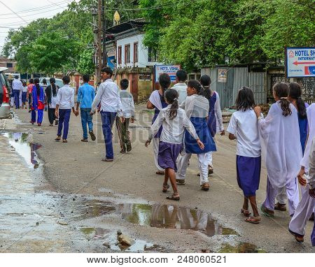Bodhgaya, India - July 9, 2015. Highschool Students Walking On Rural Road In Bodhgaya, India. Bodh G