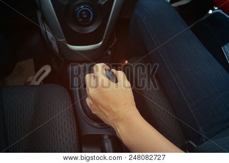 Hand Of Adult Man  Handle With Gear Stalk In Car While Driving
