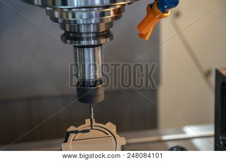 The Cnc Milling Machine Cutting The Graphite Electrode Part With The Solid Ball Endmill. Modern Manu