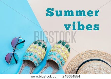 Summer Fashion Flatlay With Gradient Round Sunglasses, Straw Hat And Espadrille Sandals On The Two-t
