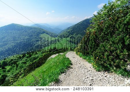 Sope With View On Cross Paths In Vratna Valley At The National Park Mala Fatra, Slovakia. Day Foto.