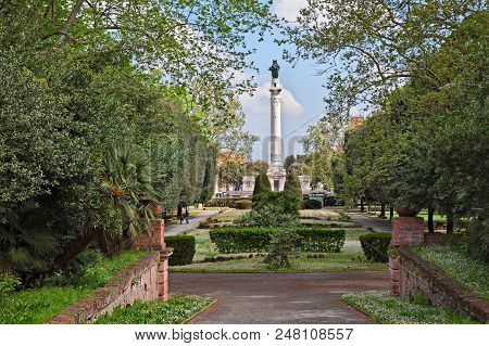 Forli, Emilia Romagna, Italy: Landscape Of The City Park And View Of The Column With The Monument To