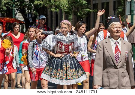 Prague, Czech Republic - July 1, 2018: Woman In Folk Costume Parading At Sokolsky Slet, A Once-every