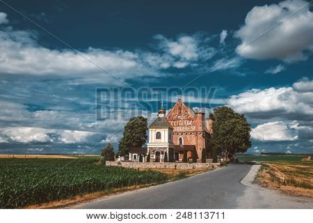 Old 15th Century St. Michael Fortified Church And Bell Tower Is In A Beautiful Summer Landscape In S