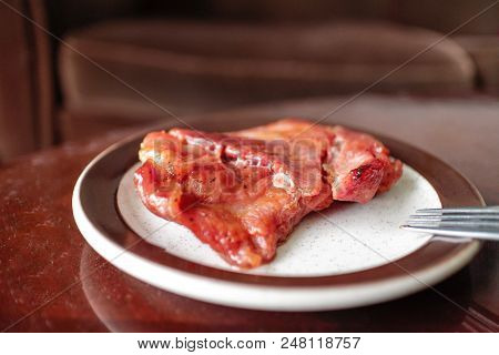 Savory Pork Tocino On An Antique Plate