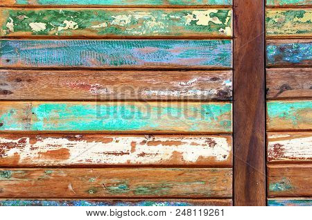 Decorative And Colorful Wood Wall. Painted Wooden Plank Background. Old Weathered Wood Texture. Indu