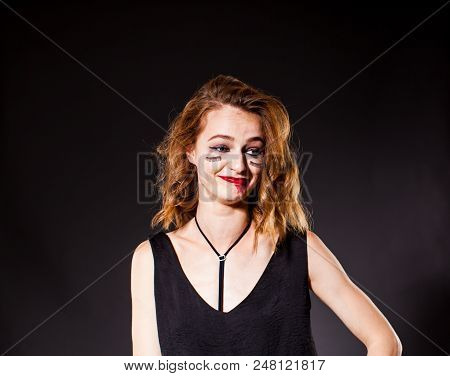 Drunk Girl With Smeared Makeup And False Eyelashes Glued To Her Cheeks. Photo-portrait Close-up.