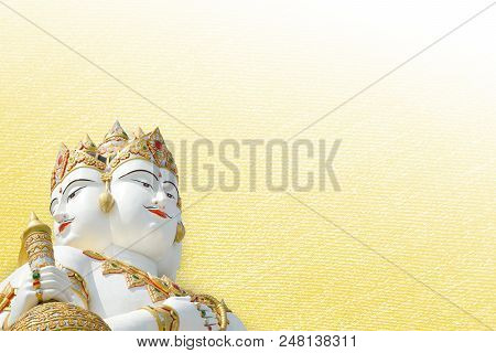Big White Statue Of Brahma On Yellow Background