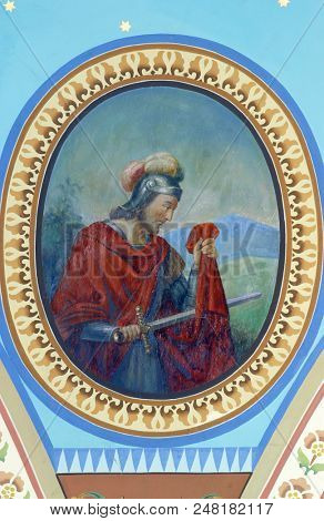 ZACRETJE, CROATIA - AUGUST 06: Saint Martin, fresco in the Parish Church of the Holy Cross in Zacretje, Croatia on August 06, 2017.