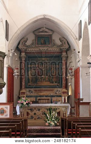 BLATO, CROATIA - MARCH 22: Main altar in the Church of All Saints in Blato, Korcula island, Croatia, on March 22, 2017.