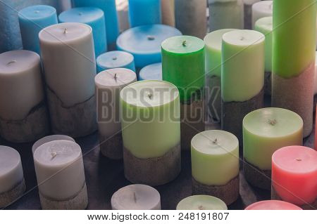 Many Large Candles In Pastel Colors. Sale
