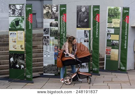 Kiev, Ukraine - April 22, 2018: Citizens Near Visual Agitation On The Actions Of Ukrainian Nationali