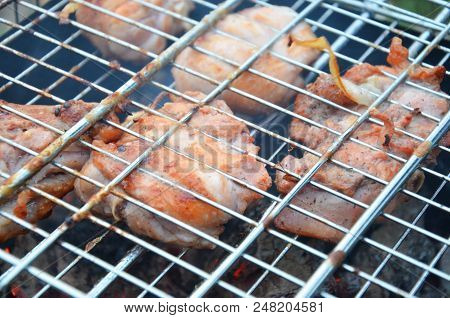 Preparation On Bbq. Dish With Roasted Meat On Abstract Background. Hot Tasty Smokey Barbecue Meal At