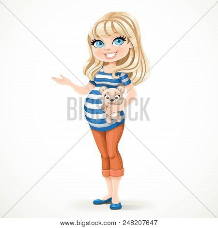 Beautiful Pregnant Blond Woman In A Striped T-shirt Is Holding A Teddy Bear In Her Hand And Somethin