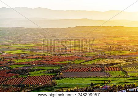 Aerial View Of Beutiful Sunset Over Green And Red Agricultiral Fields Near Pamukkale In Turkey