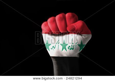 Fist Painted In Colors Of Iraq Flag