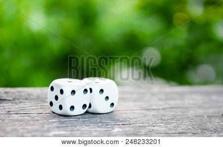 White Dice On A Green Blurry Background, Playing Dice Macro Photos